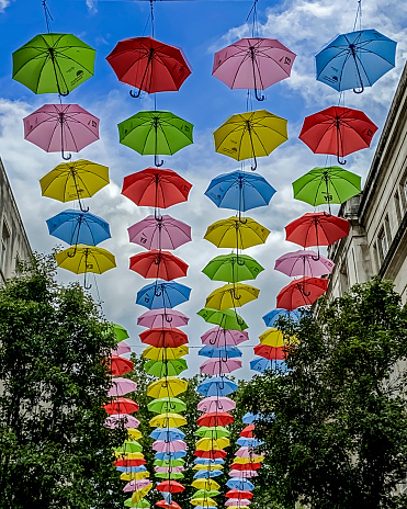 View of coloured umbrellas in the centre of Liverpool, UK.  The project is to raise awareness and understanding of ADHD and other neurodiverse conditions.  There are no people in the photograph.