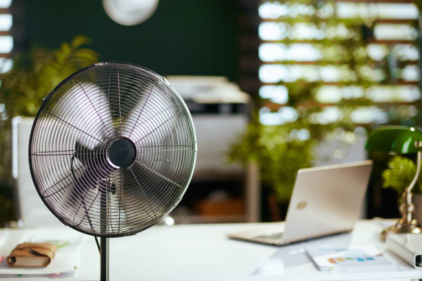 istock electric ventilator in modern green office 2138055252