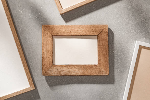 istock Wooden Frames on Gray Concrete Textured Background 2138073666