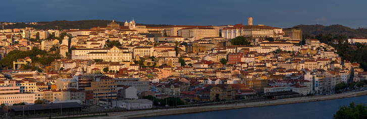 Coimbra, Portugal - Septiembre 01, 2023: Aerial view of the beautiful city of Coimbra in a sunny day at sunset. Portugal.