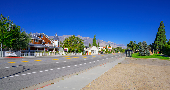View of an empty street with Sierra Nevada in the background in Independence, California, USA