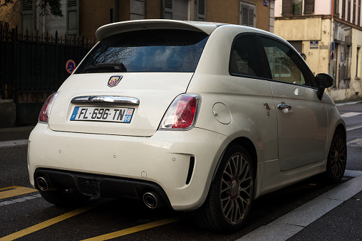 Mulhouse - France - 31 March 2024 - Rear view of white fiat abarth 595 parked in the street