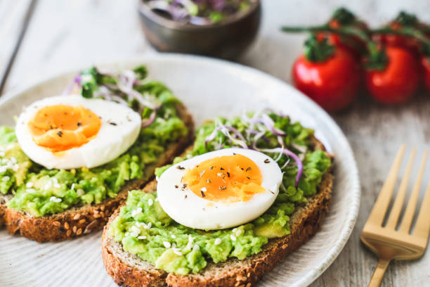 istock Healthy homemade rustic breakfast Toast With Avocado and Boiled Egg. 2138124582