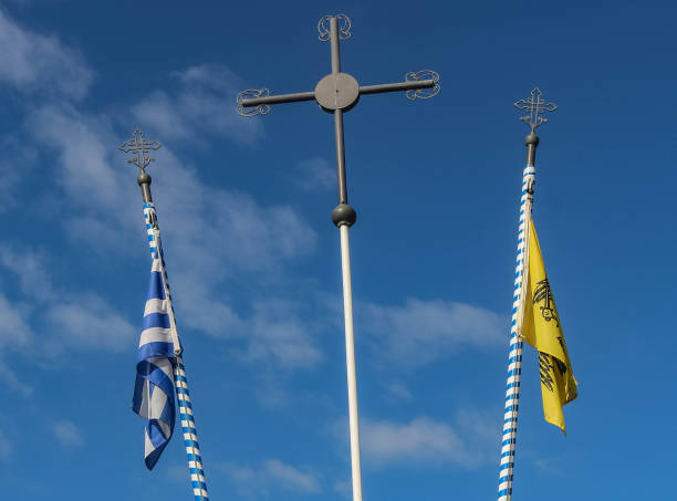 Flag of Greece and greek orthodox church flag, selective focus