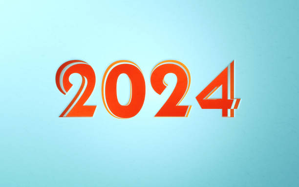 2024カットターコイズとオレンジの絡み合った紙のコンセプト