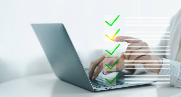 istock Business performance checklist, businessman using laptop doing online checklist survey. 2138162294