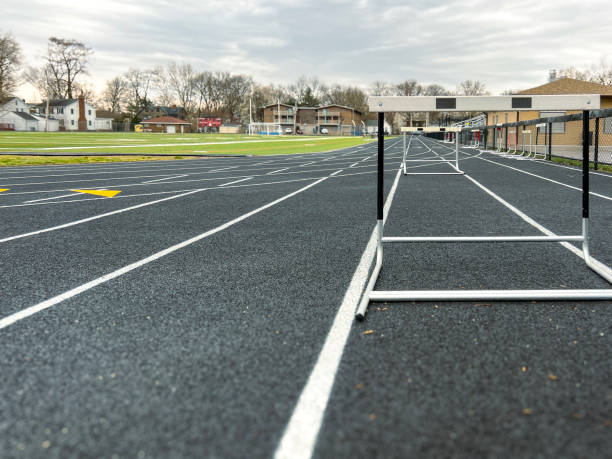 track and field running lanes - hurdle hurdling track and field stadium exercise equipment стоковые фото и изображения