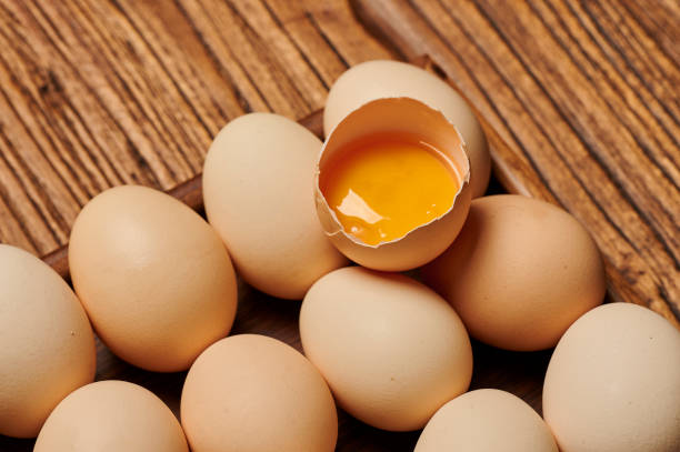 istock Fresh egg ingredients on a wooden table top 2138202108