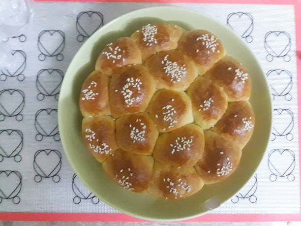 Homemade Sourdough Bread On A Red Kitchen Towel