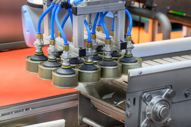 istock The high technology material handling process in canned food production by robotic system. 2138265971