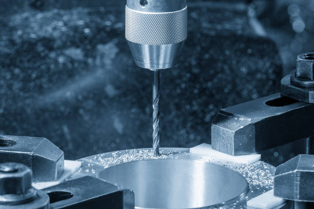 istock The hole drilling  process on NC milling machine with aluminum parts. 2138266501