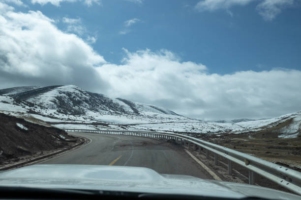 istock Driving car on the high altitude road, China 2138267547