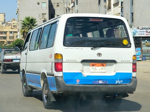 Cairo, Egypt, April 4 2024: Cairo transportation vehicles for passengers, minibus, microbus, or minicoach, a passenger-carrying motor vehicle that is designed to carry more people than a minivan, selective focus