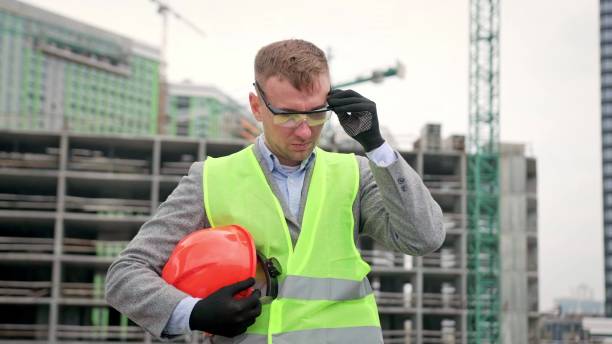 istock Serious construction superintendent is preparing for building site inspection 2138291033