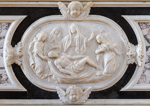 Vicenza - The the marble baroque relief of Pieta on the side altar of church Chiesa di Santa Maria dei Servi by Virginio and Flaminio Negri (1609).