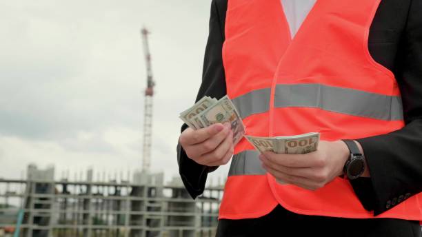 istock Professional man counting banknotes with money outside 2138320904
