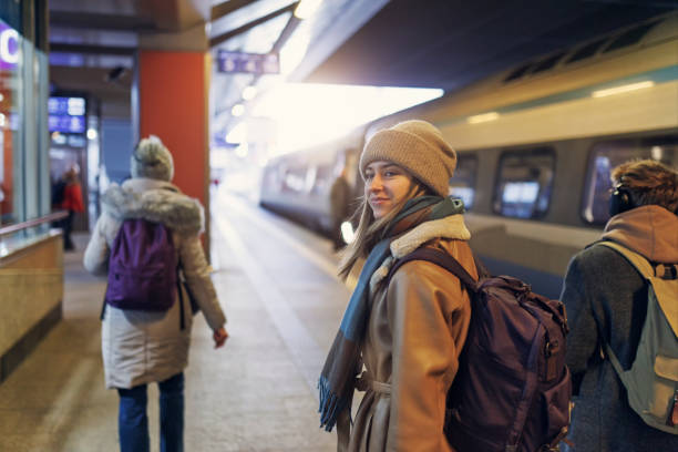 istock Family walking on a railroad platform on a winter day 2138343471