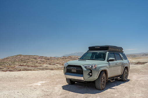 Capitol Reef National Park, United States: June 19, 2023: Toyota 4Runner With Roof Top Tent Three Quarter View A Top Desert View