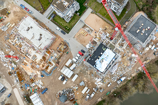 Large construction site, cranes and equipment - aerial view