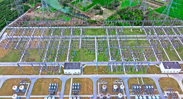 Aerial shot of substation power tower equipment landscape