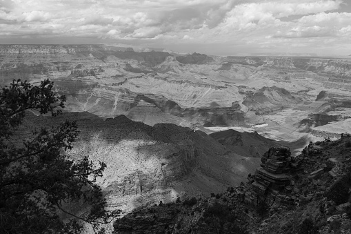 Panoramic photo of Grand Canyon in Arizona with cloud in black and white