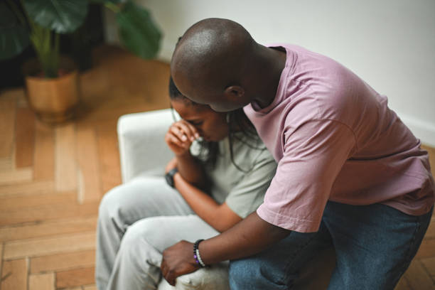istock young man comforting his girlfriend 2138560320