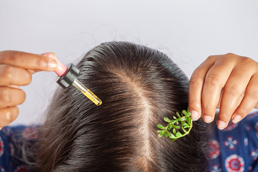 herb oil, hair fall treatment, hair oil, closeup, indian, dropper