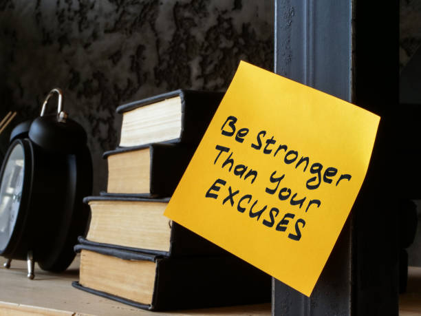 istock Be stronger than your excuses inscription on memo stick. 2138587710