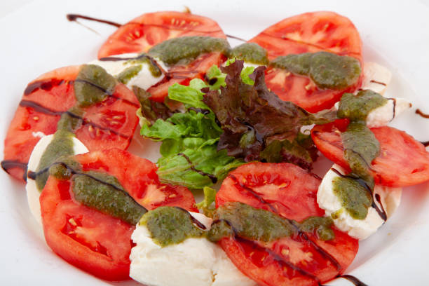 sliced tomato and mozzarella cheese, basil and olive oil for a delicious caprese salad. Yummie. See also this RELATED images: