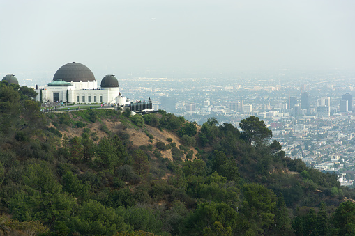 Los Angeles, United States – July 26, 2014: A mountain-top view of the Griffith Observatory and downtown Los Angeles