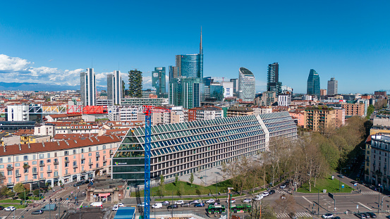 Aerial view of of Milan, skyscrapers. Palazzo Lombardia and Bosco Verticale. Unicredit tower, Unipol tower. Pyramid roof. Excavations and foundations of the Resistance museum 04-02-2024. Italy