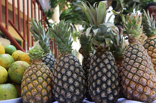 Small business in the streets, fresh pineapple stands and discounted prices.