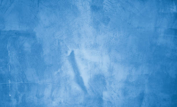 istock bright blue plaster concrete wall texture use as background. premium cyan wallpaper with copy-space. 2138622093