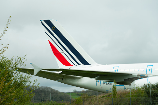 Ossun, France - 26 March, 2024: Airplane tail of an Air France Airbus A380 being scrapped