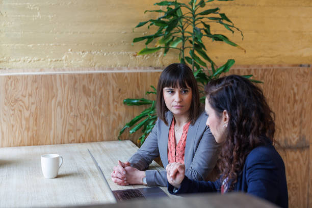 istock Two businesswoman working in office 2138646175