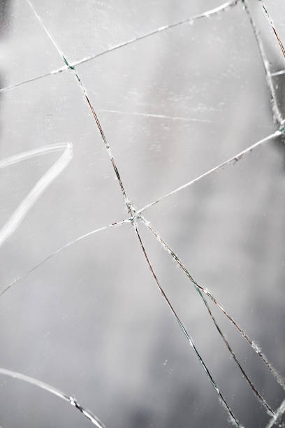 istock cracks texture of broken mirror, glass, Metaphor for shattered, Broken Dreams, Artistic Representation of Fragility, Safety Hazards in Home Décor, Environmental Concerns 2138694763