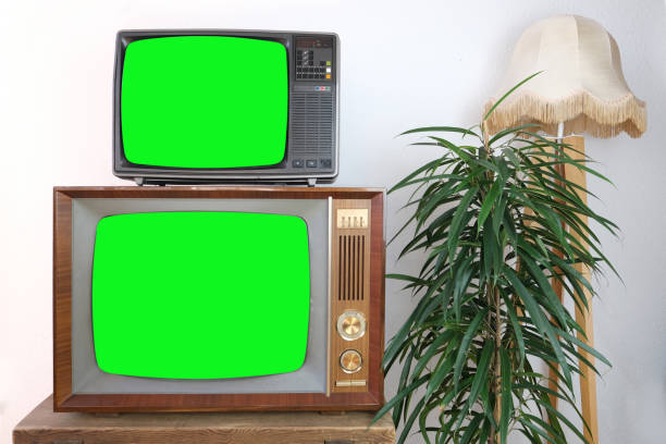 istock two old TV screens, footage Dated TV Set with white Screen Mock Up Chroma Key Template Display, living room, retro style Television 2138697903
