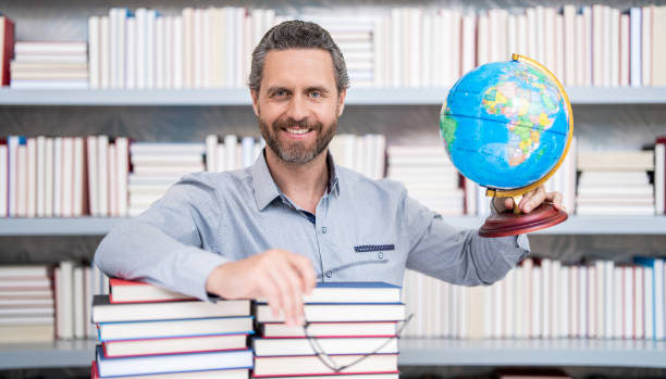 man get university education. school education with man teacher. education and knowledge. back to school. teachers day. teachers education in school. knowledge day. Lost in a good book.