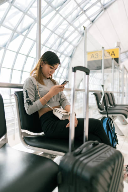 istock Waiting for boarding at airport gate 2138703197