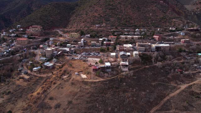 Aerial View of Jerome, Arizona USA. Old Mining Town on Black Hills, Drone Shot