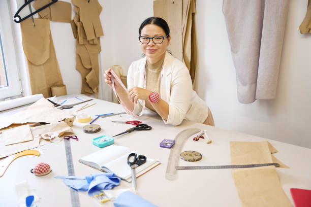 istock Lady designer in the atelier at the workplace 2138767770