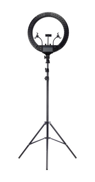 istock LED ring light on tripod with three phone holders isolated from background 2138780377