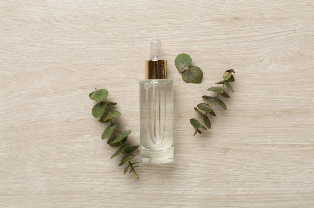istock Herbal face serum on wooden background, top view 2138789310