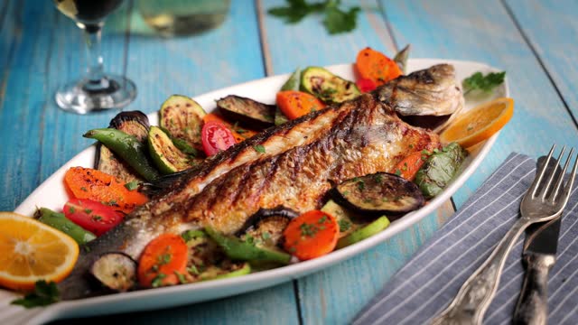 Sea bass grilled fish with veggies
