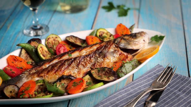 European bass grilled fish with veggies