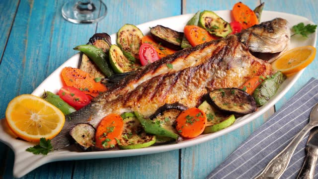 Mediterranean grilled fish with veggies
