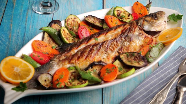 Mediterranean grilled fish with veggies