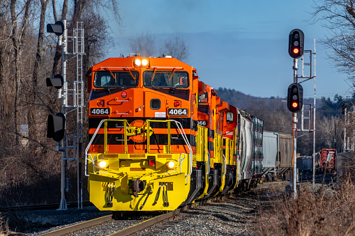 Brattleboro, VT - March 1, 2023 - New England Central job 611 is departing the rail yard at Brattleboro, VT,  southbound with the NECR C40-8W trio of 4064, 4064, and 4063 on February 29, 2024.  The NECR Palmer Subdivision is host to the first run of the freshly painted and newly acquired General Electric locomotives that Genesee & Wyoming acquired earlier in 2023.