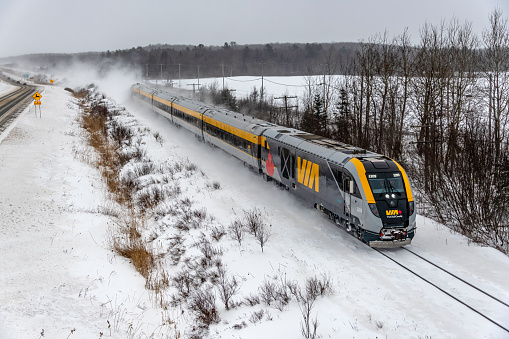Quebec, QC - January 13, 2024: The VIA Rail Canada Siemens train sets reportedly performed well in winter conditions and brought a new uniformity look to Corridor Passenger Services. Powered by Siemens Charger locomotives, which are equipped with a fuel-efficient Cummins QSK95, 16-cylinder diesel engine providing 4200 hp, the four-car train set is book-ended by a cab car of similar design to the Charger and allows for bi-directional operations without having to turn train sets. Since winter is the toughest time for railroading at baseline, it was good to see these train sets performing well and at speed.