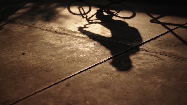 Shadow of bike man.